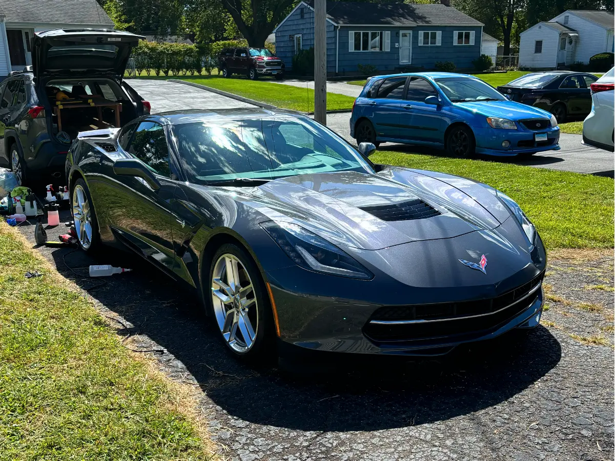 Red Corvette exterior shining after auto detailing service